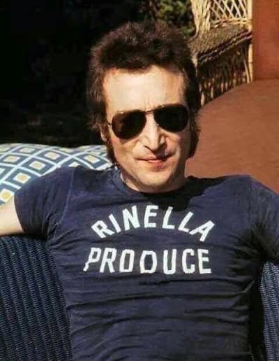 John Lennon wearing blue Rinella Produce t-shirt